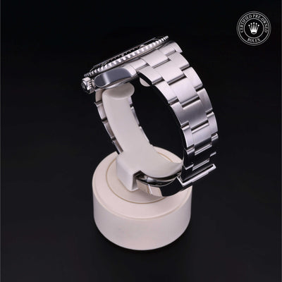Rolex Certified Pre-owned Submariner M124060-0001 front on black background