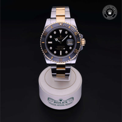 Rolex Certified Pre-owned Submariner M116613LN-0003 front on black background