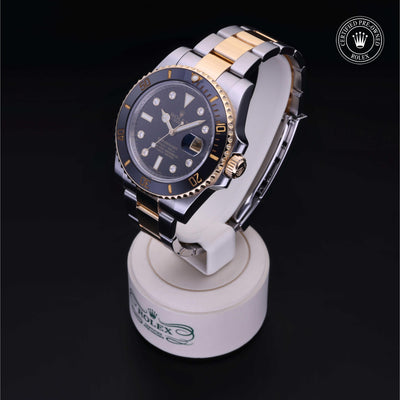 Rolex Certified Pre-owned Submariner M116613LN-0003 front on black background