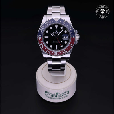 Rolex Certified Pre-owned GMT II M126710BLRO-0002 front on black background