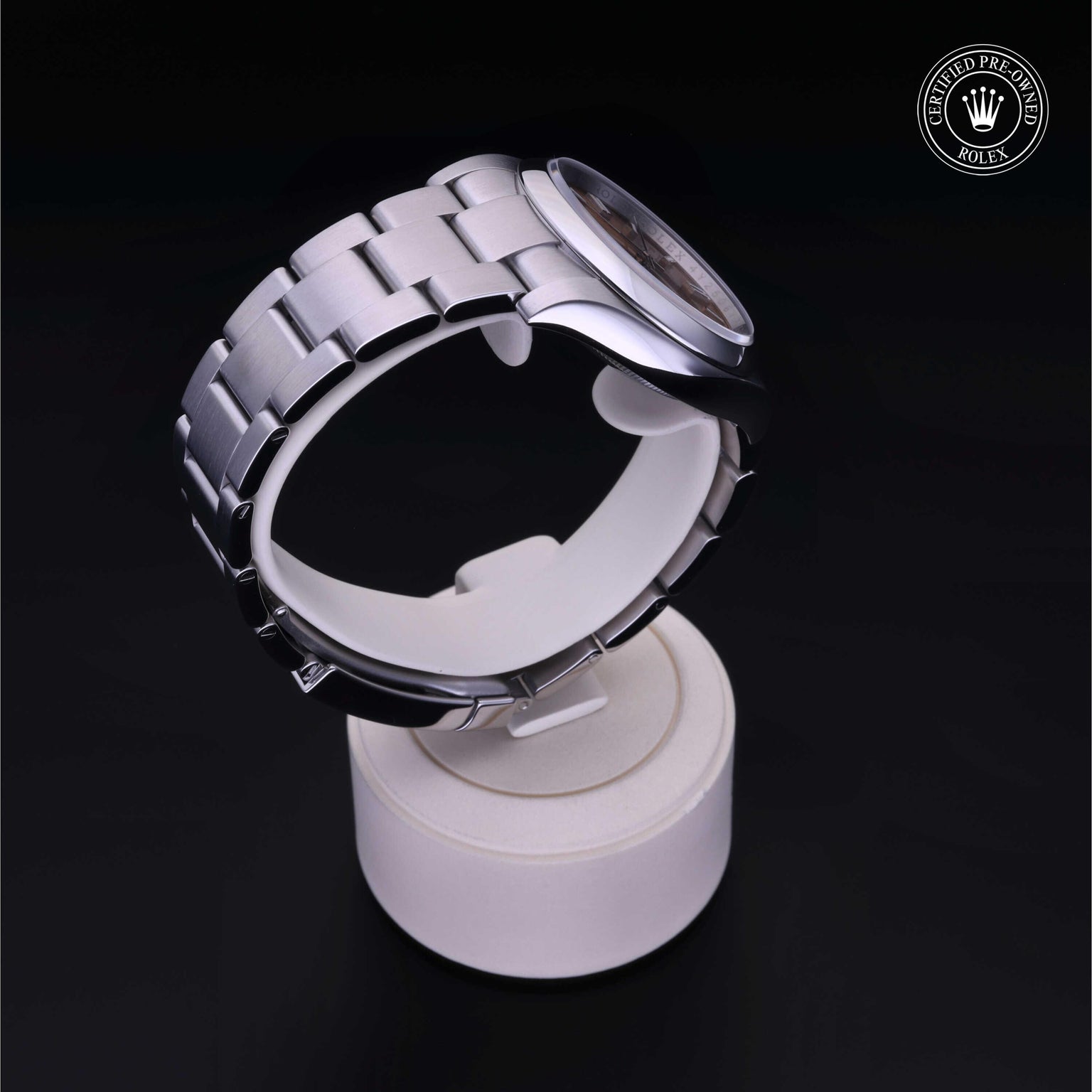 Rolex Certified Pre-owned Oyster Perpetual M116000-0011 front on black background