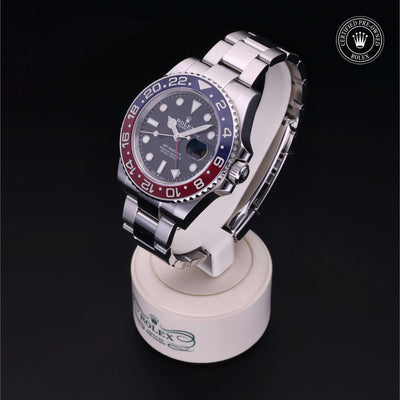 Rolex Certified Pre-owned GMT M126710BLRO-0002 front on black background