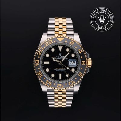 Rolex Certified Pre-owned GMT M126713GRNR-0001 front on black background