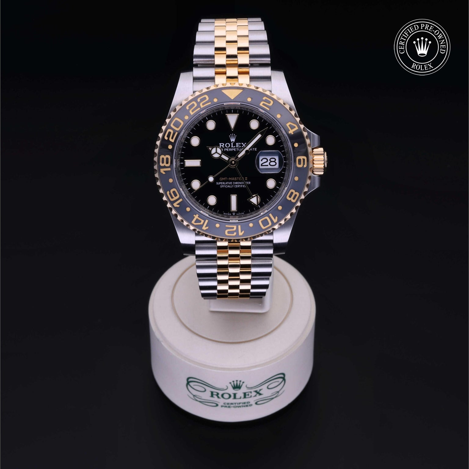Rolex Certified Pre-owned GMT M126713GRNR-0001 front on black background