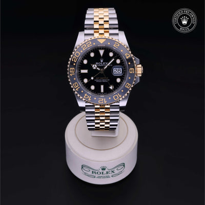 Rolex Certified Pre-owned GMT M126713GRNR-0001 front on black background