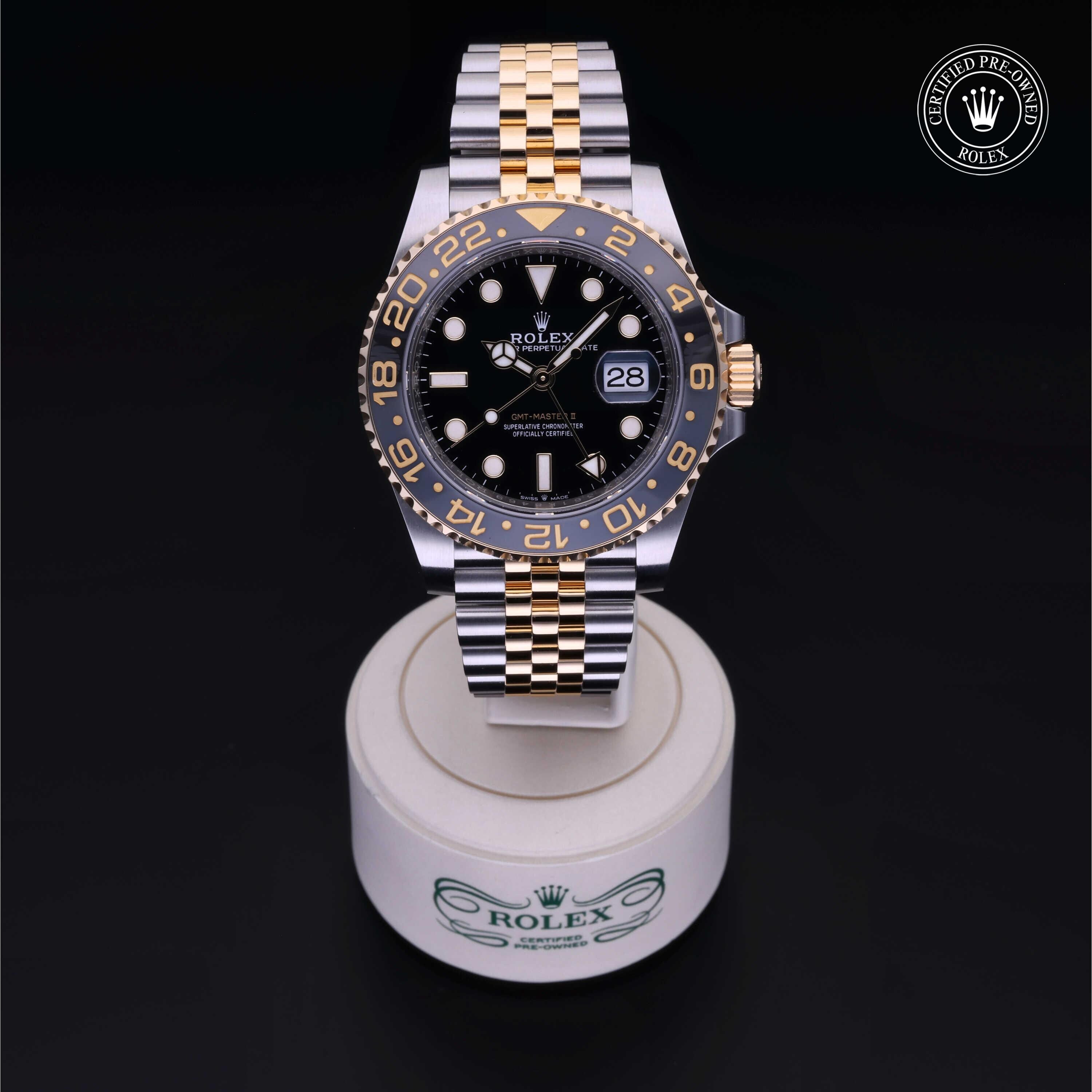 Rolex Certified Pre-owned GMT M126713GRNR-0001 front on black background
