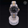 Rolex Certified Pre-owned GMT M126713GRNR-0001 front on black background