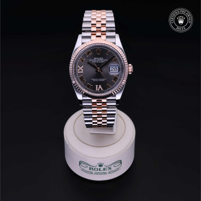 Rolex Certified Pre-owned Datejust M126231-0023 front on black background
