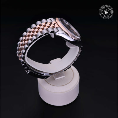 Rolex Certified Pre-owned Datejust M126231-0023 front on black background
