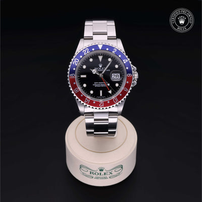 Rolex Certified Pre-owned GMT M16710BLRO-0005 front on black background