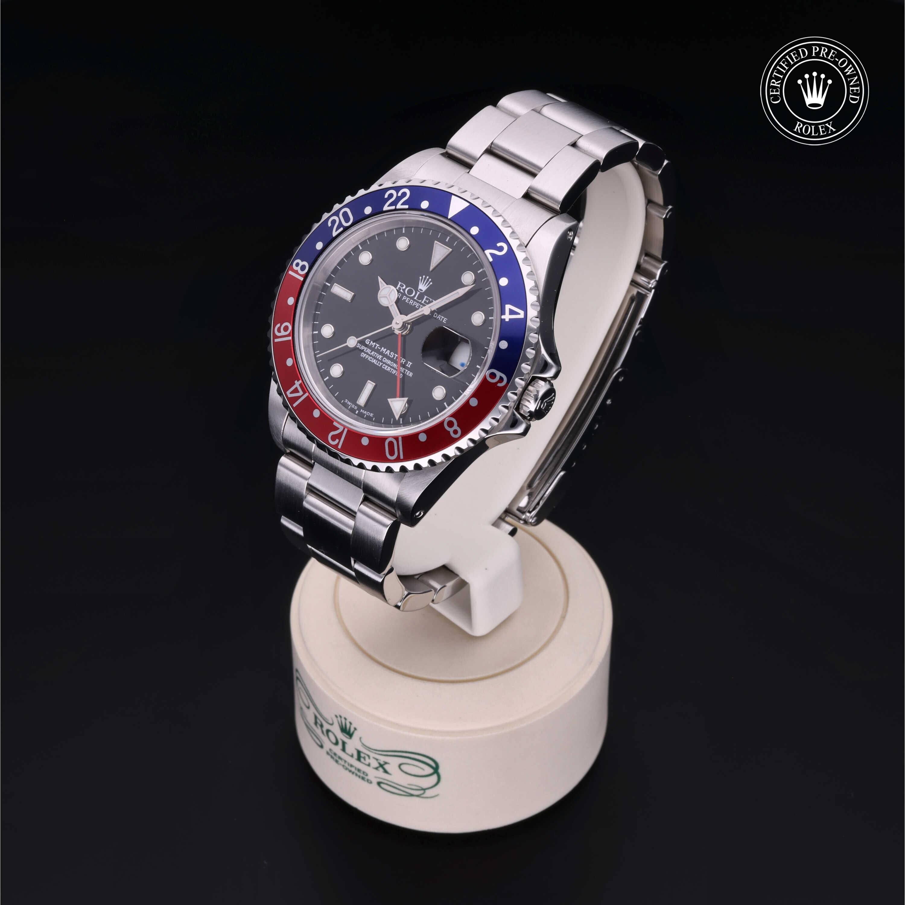 Rolex Certified Pre-owned GMT M16710BLRO-0005 front on black background