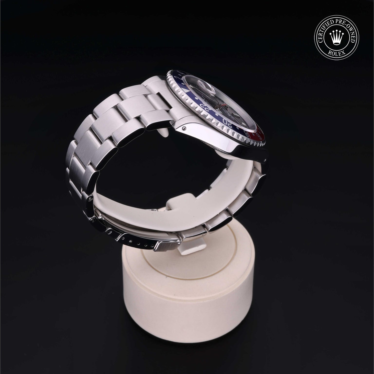 Rolex Certified Pre-owned GMT M16710BLRO-0005 front on black background