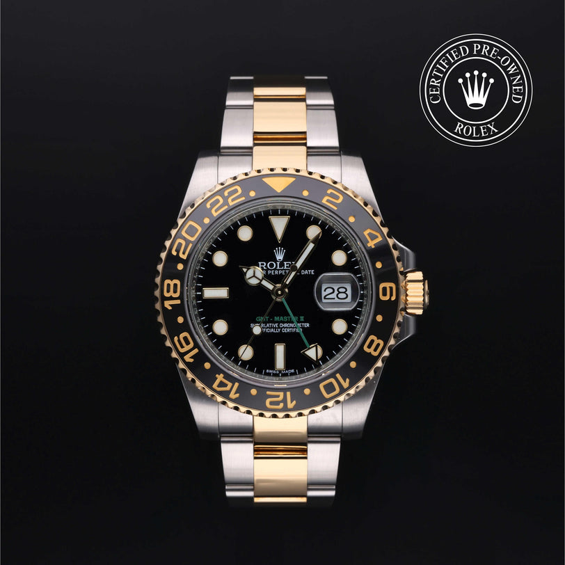 Rolex Certified Pre-owned GMT M116713LN-0001 front on black background