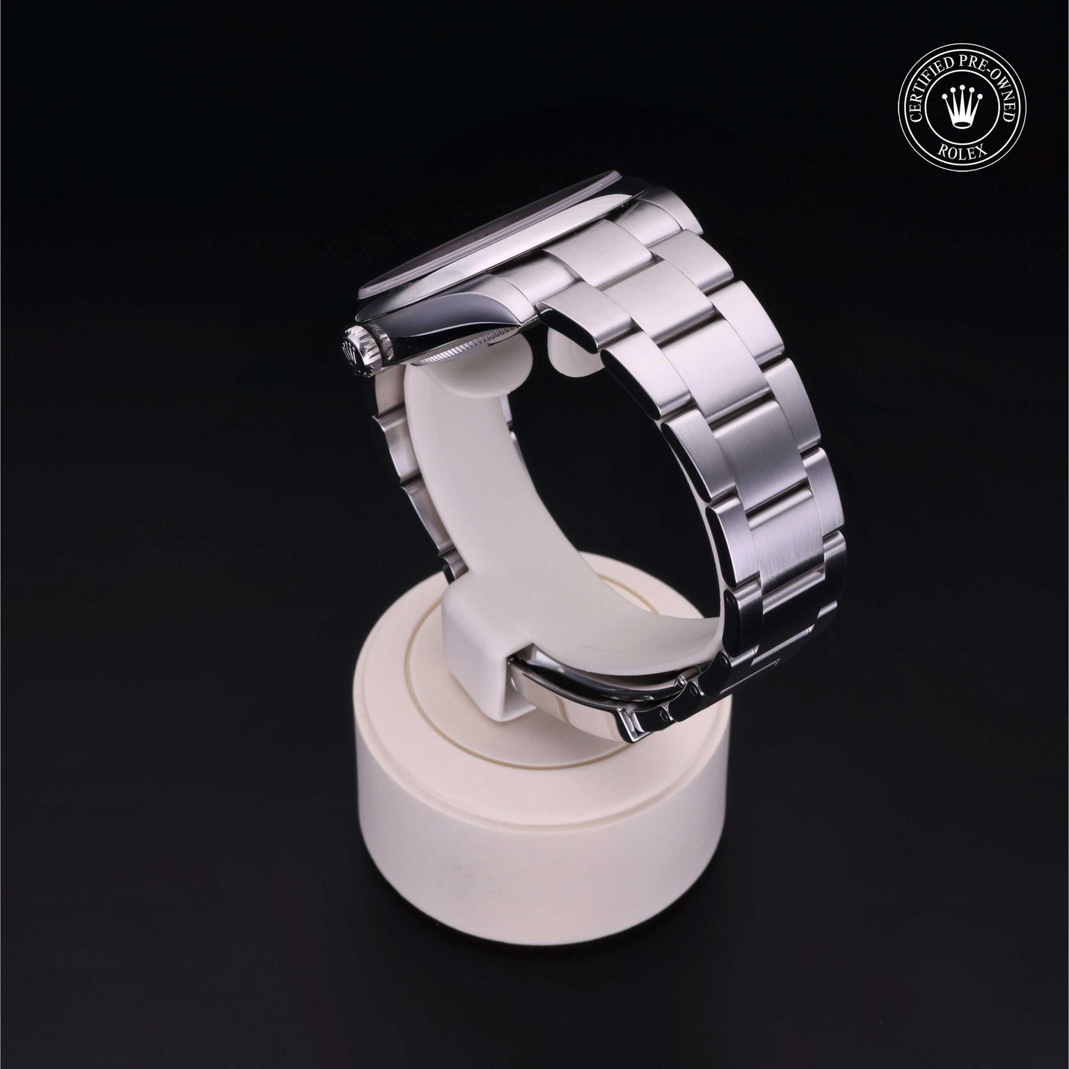 Rolex Certified Pre-owned Oyster Perpetual M124300-0004 front on black background