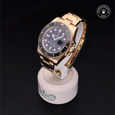 Rolex Certified Pre-owned Submariner M116618LN-0001 front on black background