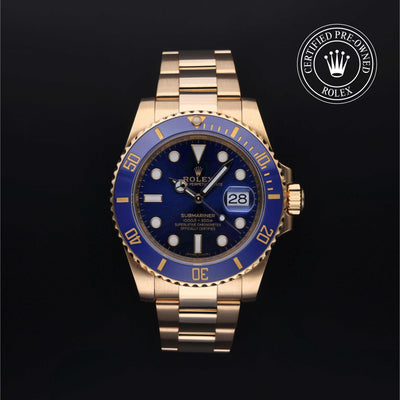 Rolex Certified Pre-owned Submariner M116618LB-0003 front on black background