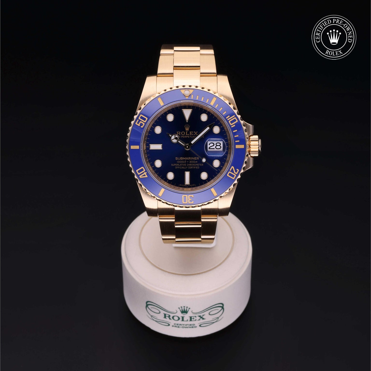 Rolex Certified Pre-owned Submariner M116618LB-0003 front on black background
