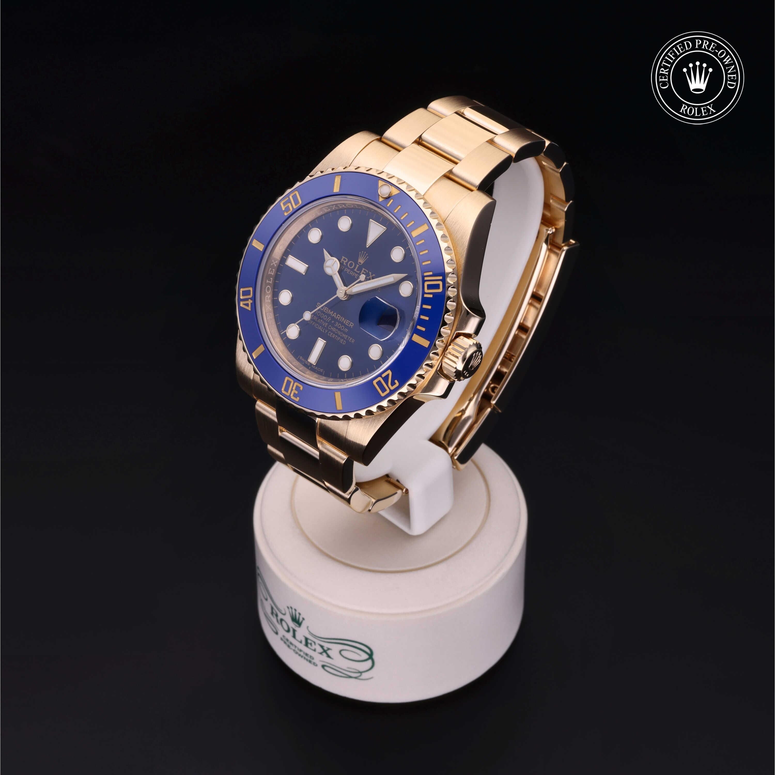 Rolex Certified Pre-owned Submariner M116618LB-0003 front on black background