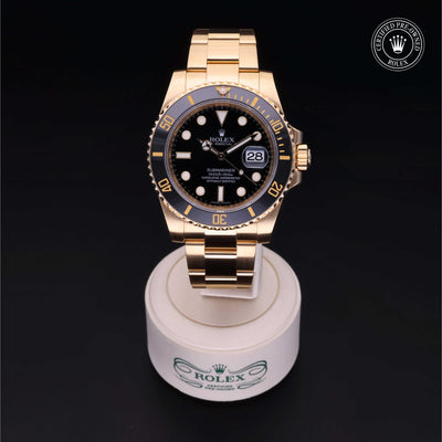 Rolex Certified Pre-owned Submariner M116618LN-0001 front on black background