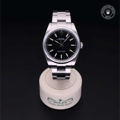 Rolex Certified Pre-owned Oyster Perpetual M114300-0005 front on black background
