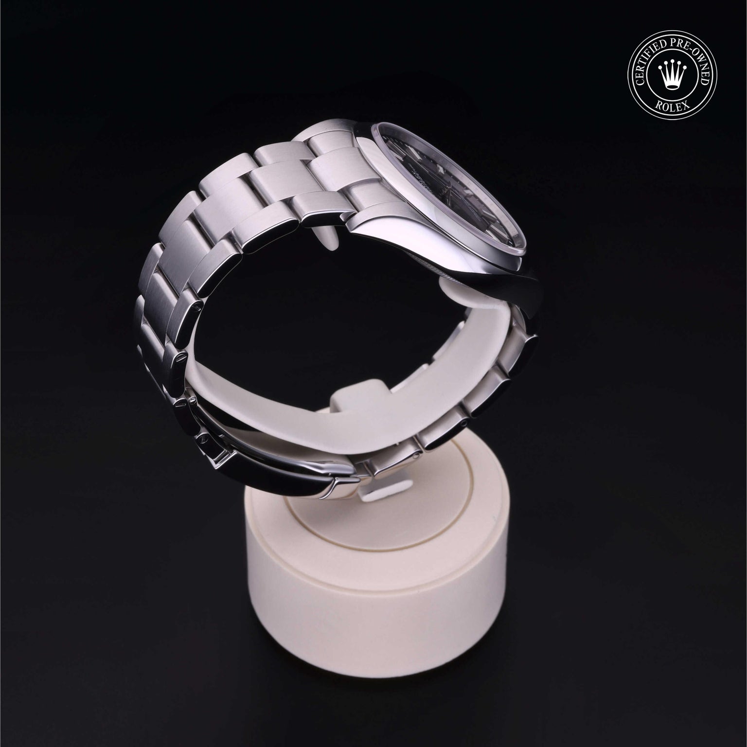 Rolex Certified Pre-owned Oyster Perpetual M114300-0005 front on black background