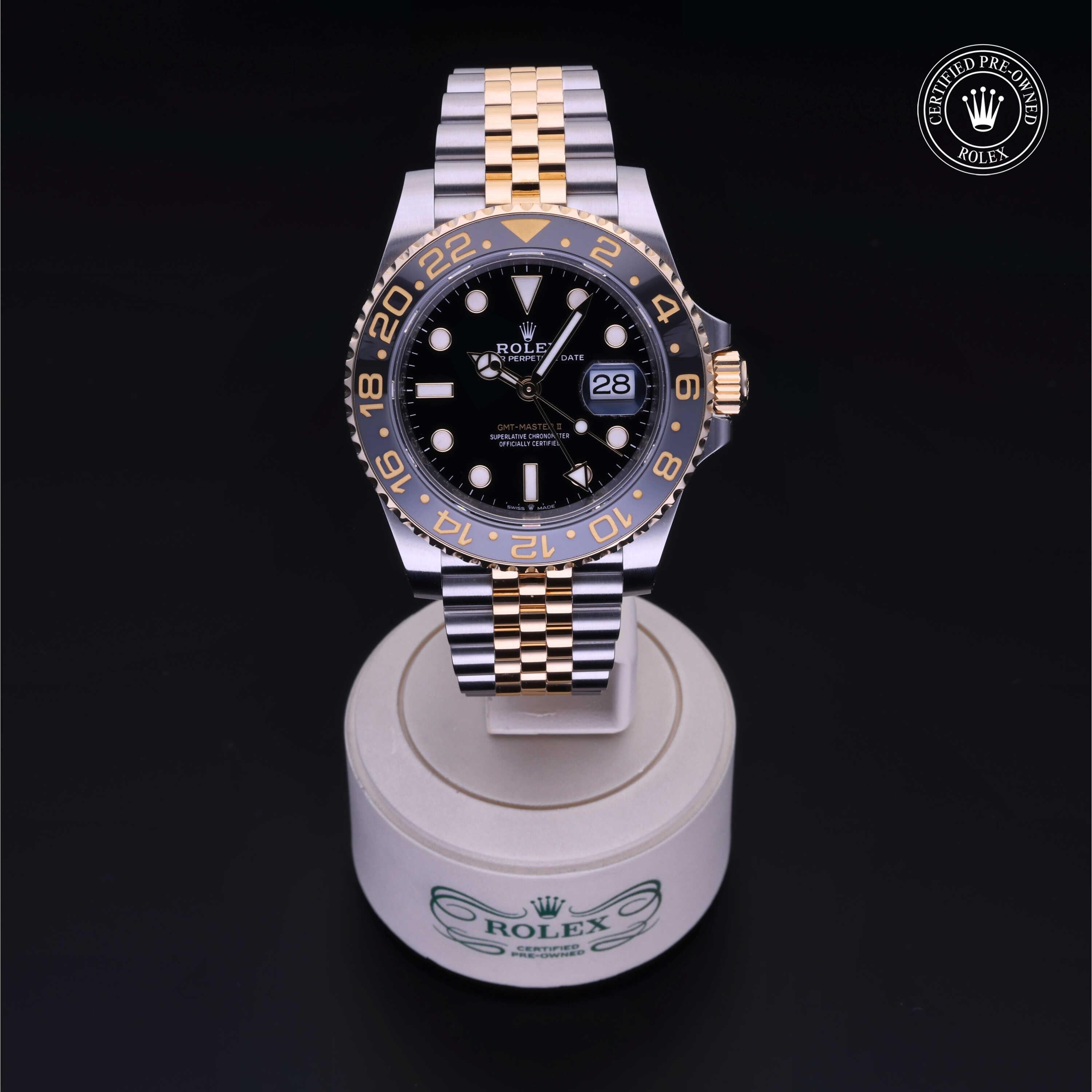 Rolex Certified Pre-owned GMT M126713GRNR-0001 front on black background