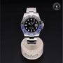 Rolex Certified Pre-owned GMT M116710BLNR-0002 front on black background
