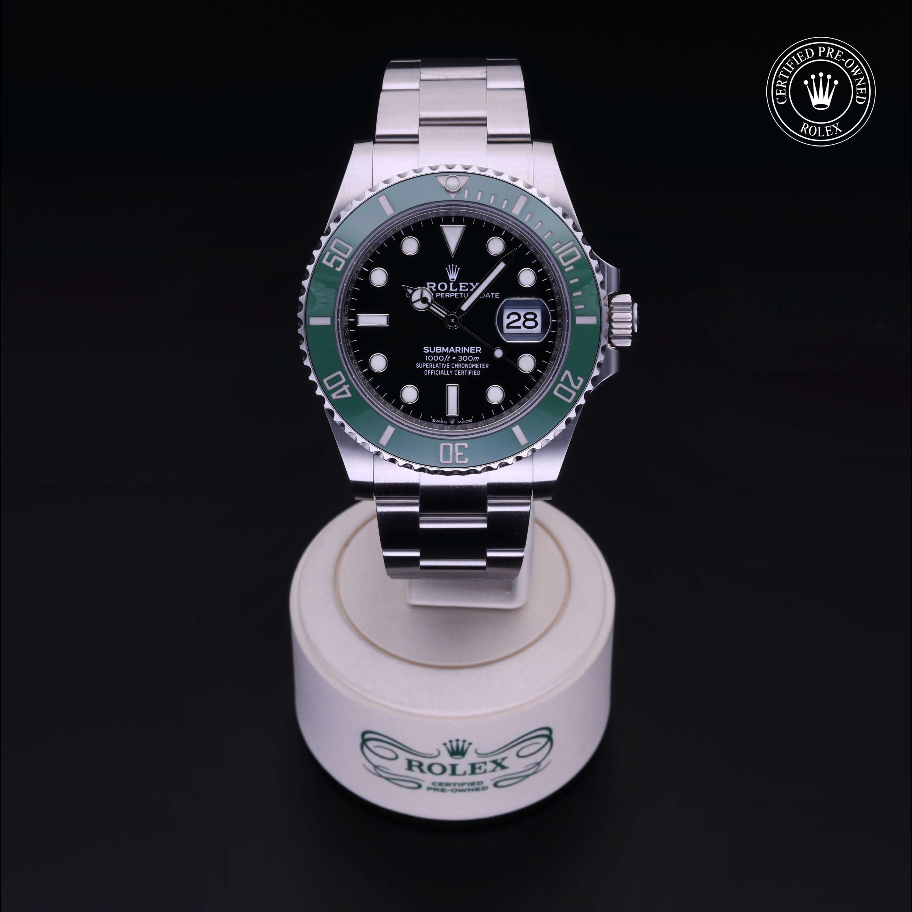 Rolex Certified Pre-owned Submariner M126610LV-0002 front on black background