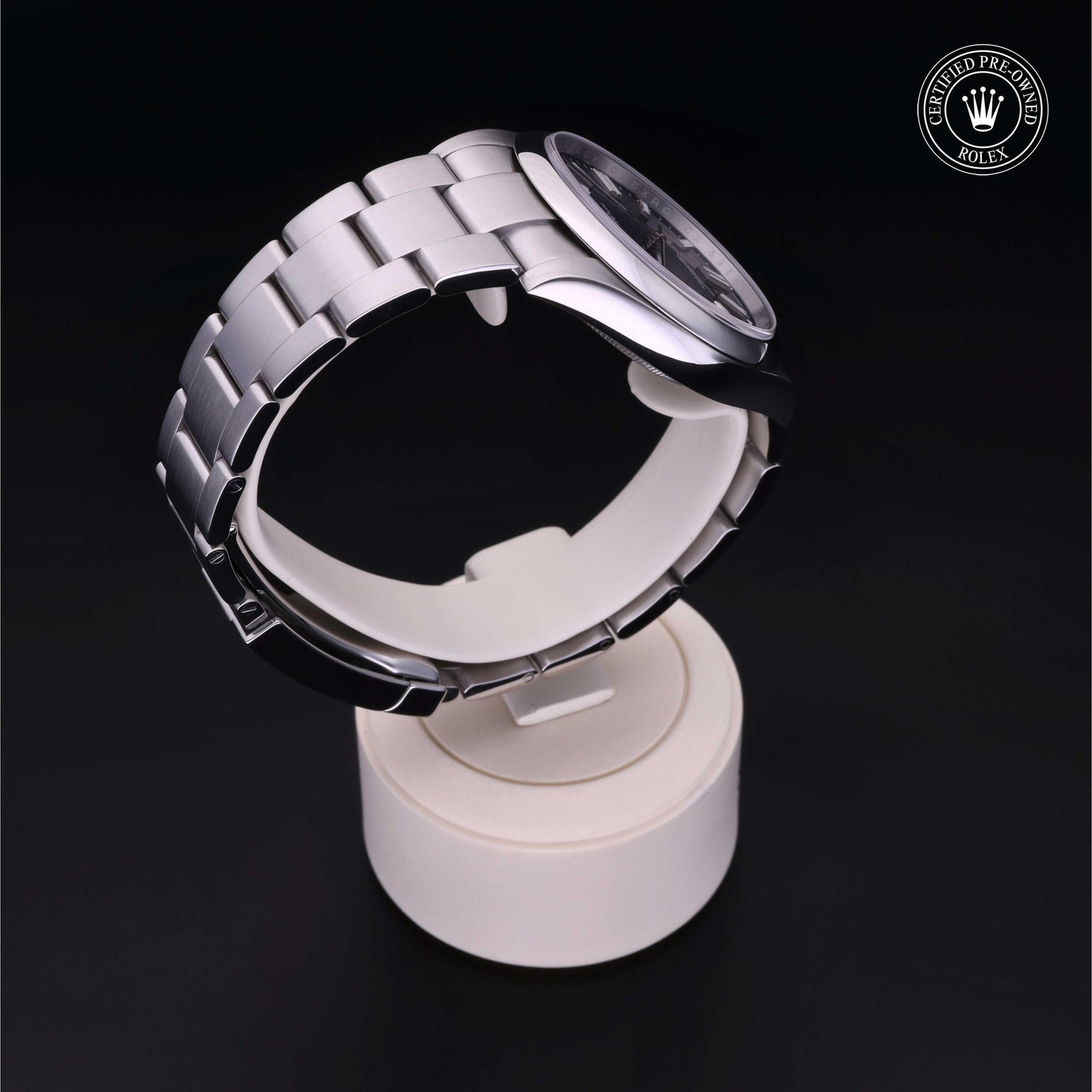 Rolex Certified Pre-owned Oyster Perpetual M124300-0003 front on black background