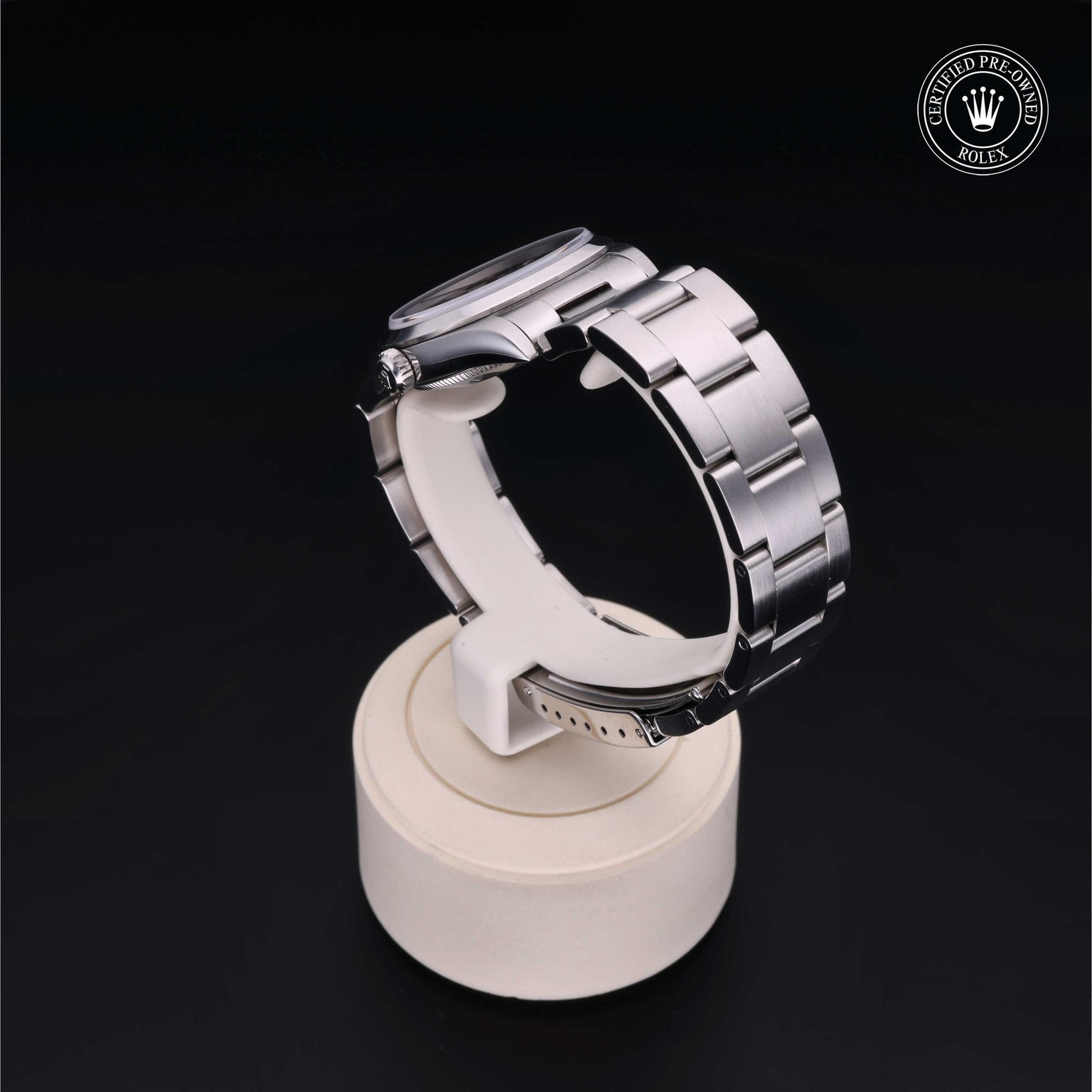 Rolex Certified Pre-owned Oyster Perpetual M77080-0025 front on black background