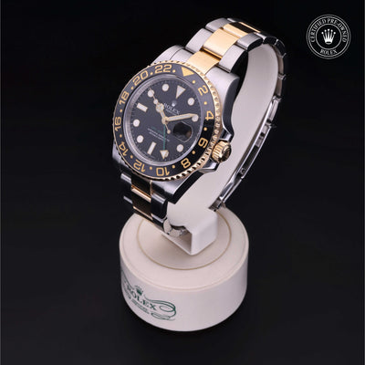 Rolex Certified Pre-owned GMT M116713LN-0001 front on black background