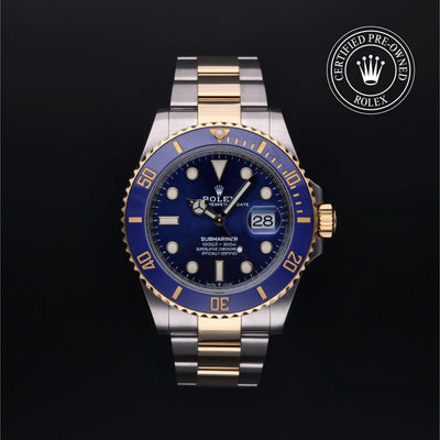 Rolex Certified Pre-owned Submariner M126613LB-0002 front on black background