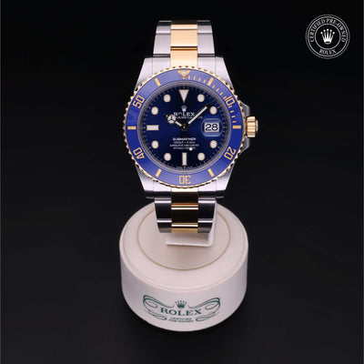 Rolex Certified Pre-owned Submariner M126613LB-0002 front on black background