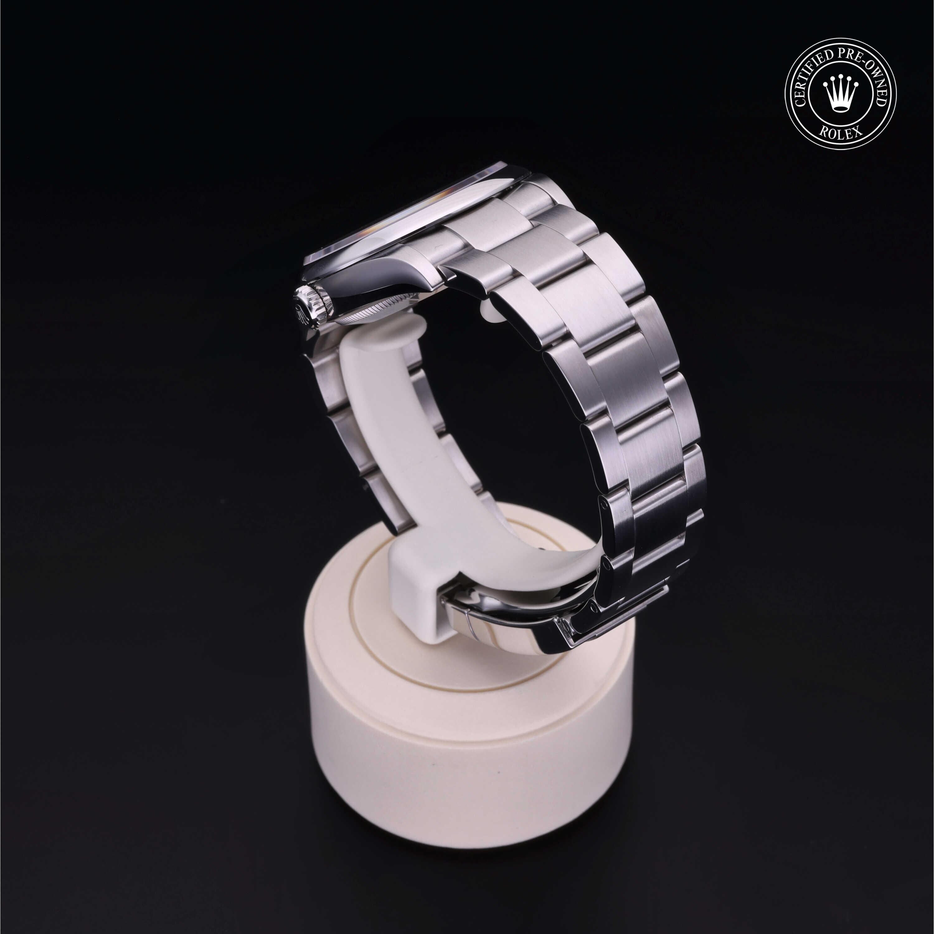 Rolex Certified Pre-owned Oyster Perpetual M126000-0008 front on black background
