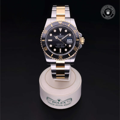 Rolex Certified Pre-owned Submariner M116613LN-0001 front on black background