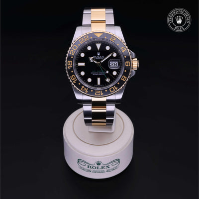 Rolex Certified Pre-owned GMT M116713LN-0001 front on black background