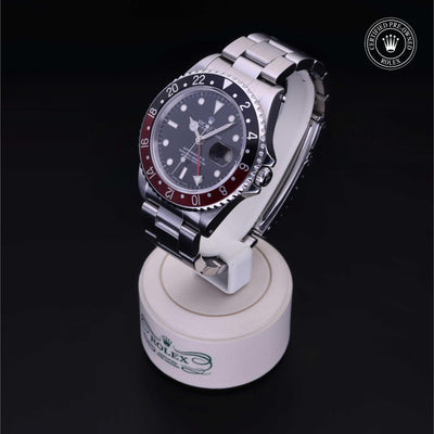 Rolex Certified Pre-owned GMT M16710-0009 front on black background