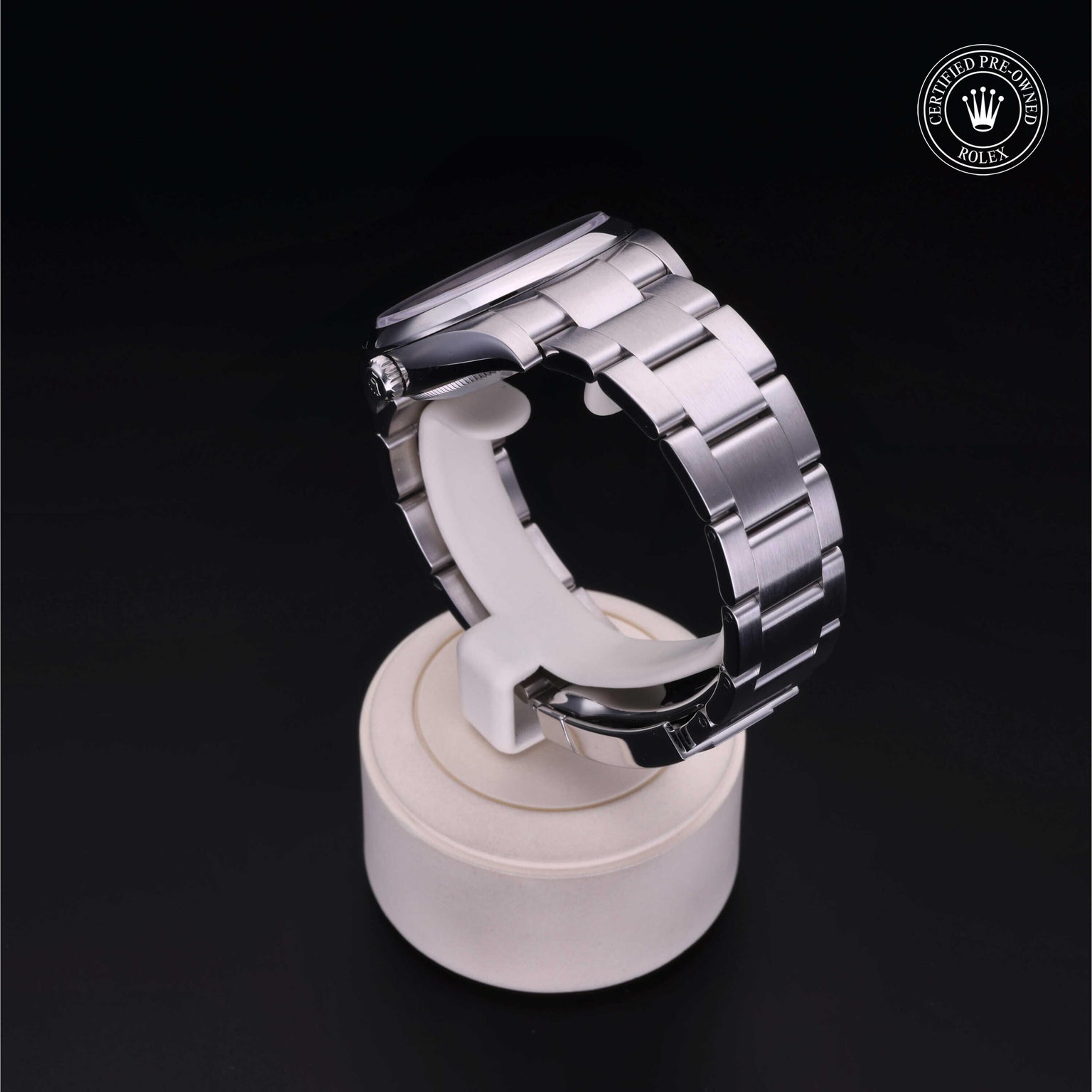 Rolex Certified Pre-owned Oyster Perpetual M114200-0014 front on black background