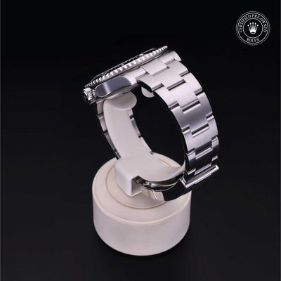 Rolex Certified Pre-owned Submariner M124060-0001 front on black background