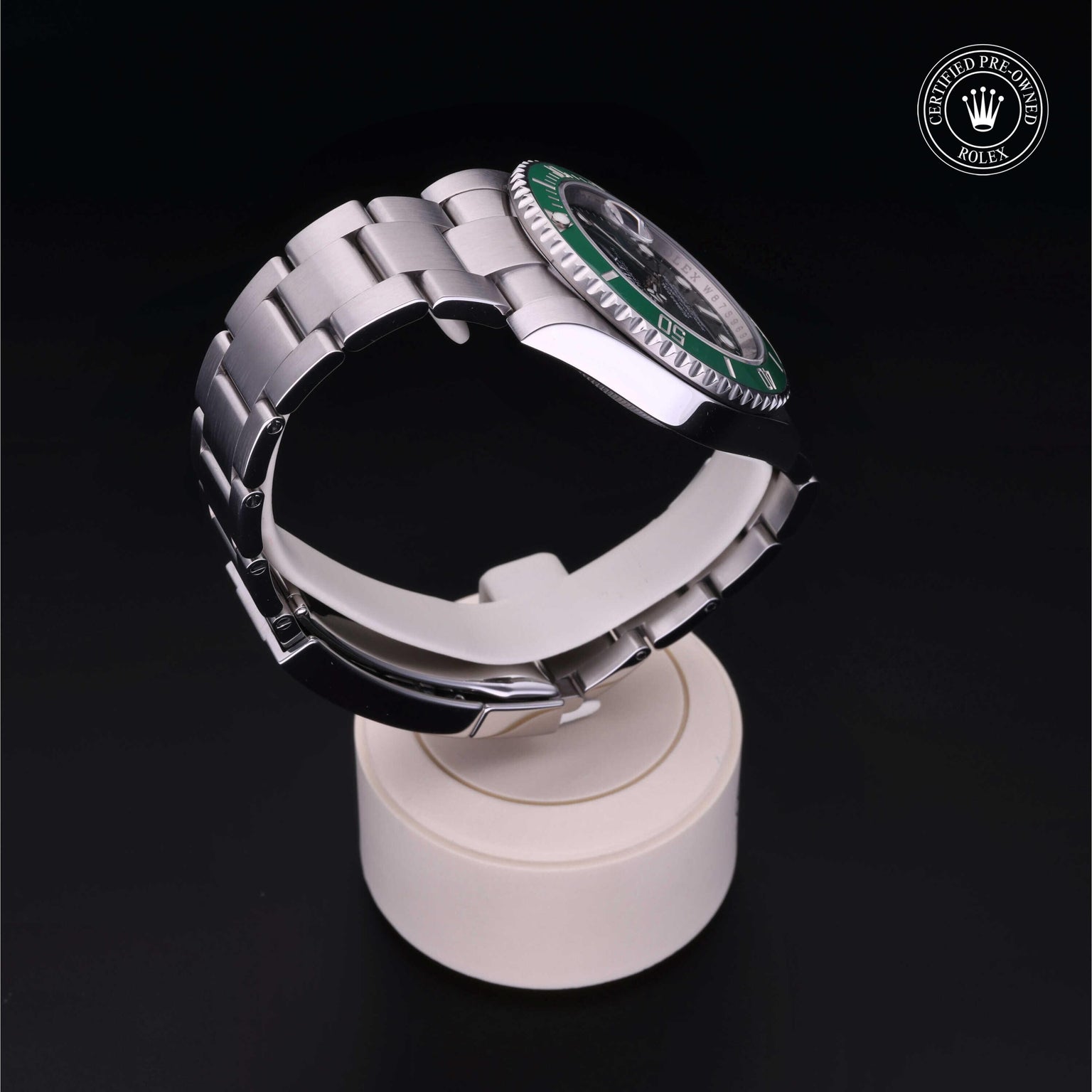 Rolex Certified Pre-owned Submariner M116610LV-0002 front on black background