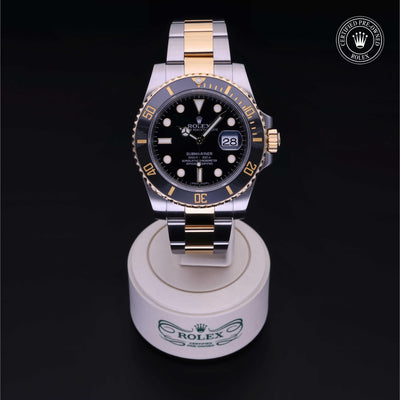 Rolex Certified Pre-owned Submariner M116613LN-0001 front on black background