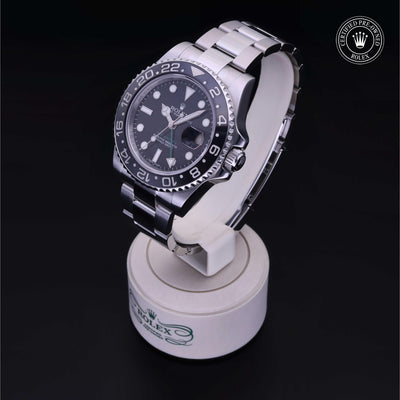 Rolex Certified Pre-owned GMT M116710LN-0001 front on black background