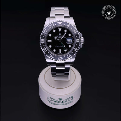 Rolex Certified Pre-owned GMT M116710LN-0001 front on black background