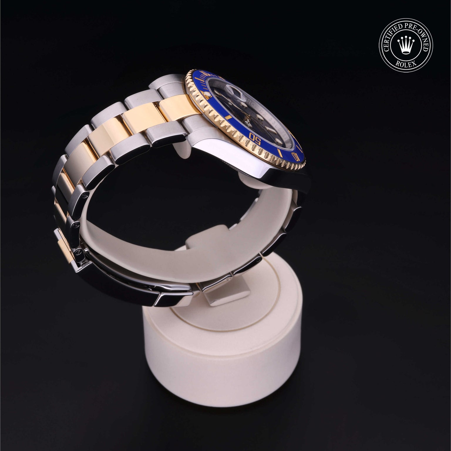 Rolex Certified Pre-owned Submariner Date M116613LB-0005 front on black background