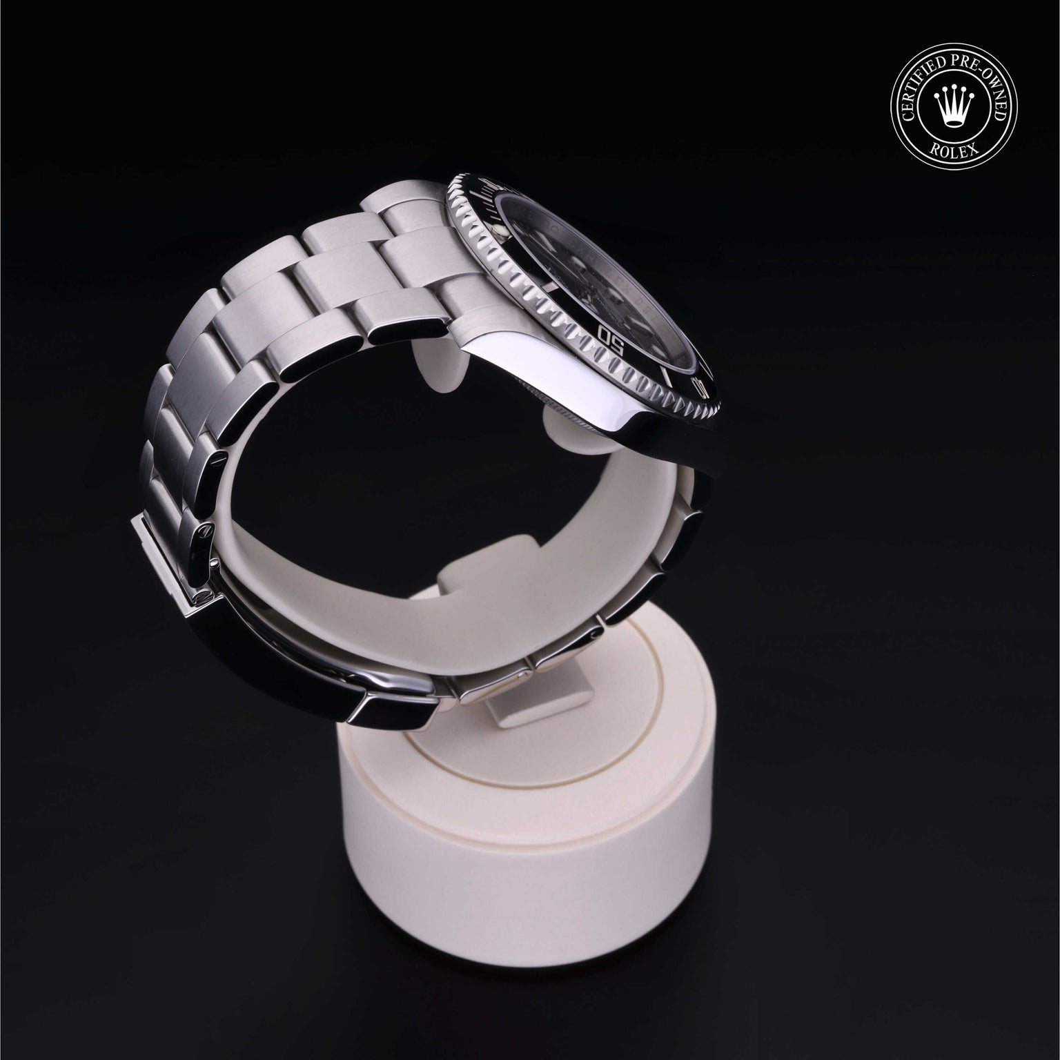 Rolex Certified Pre-owned Submariner Non Date M114060-0002 front on black background