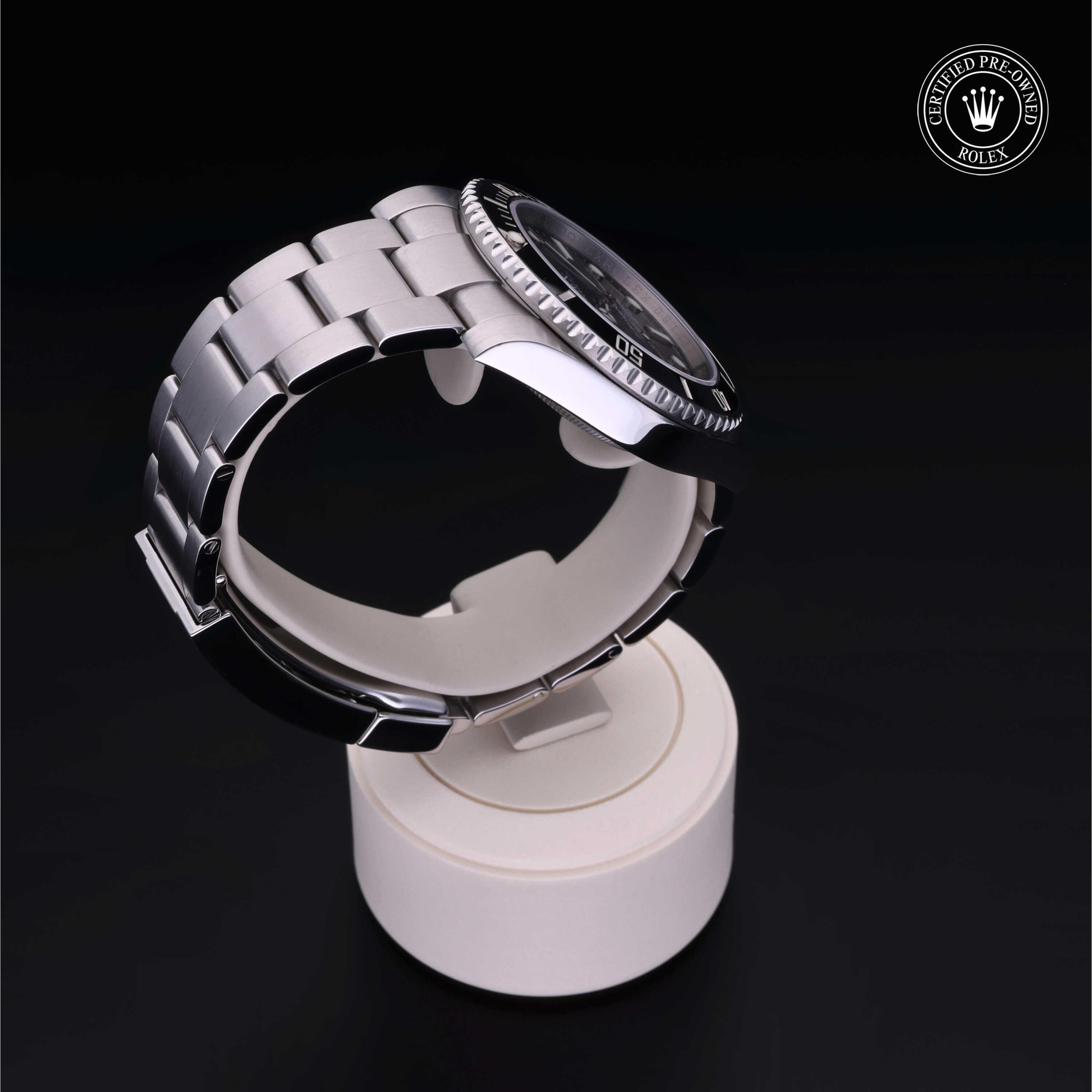 Rolex Certified Pre-owned Submariner Non Date M114060-0002 front on black background