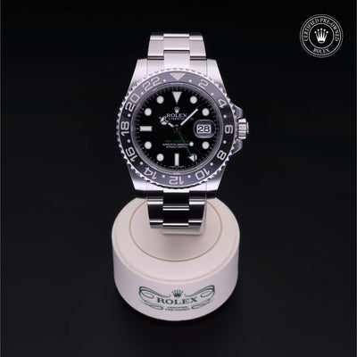 Rolex Certified Pre-owned GMT M116710LN-0001 front on black background