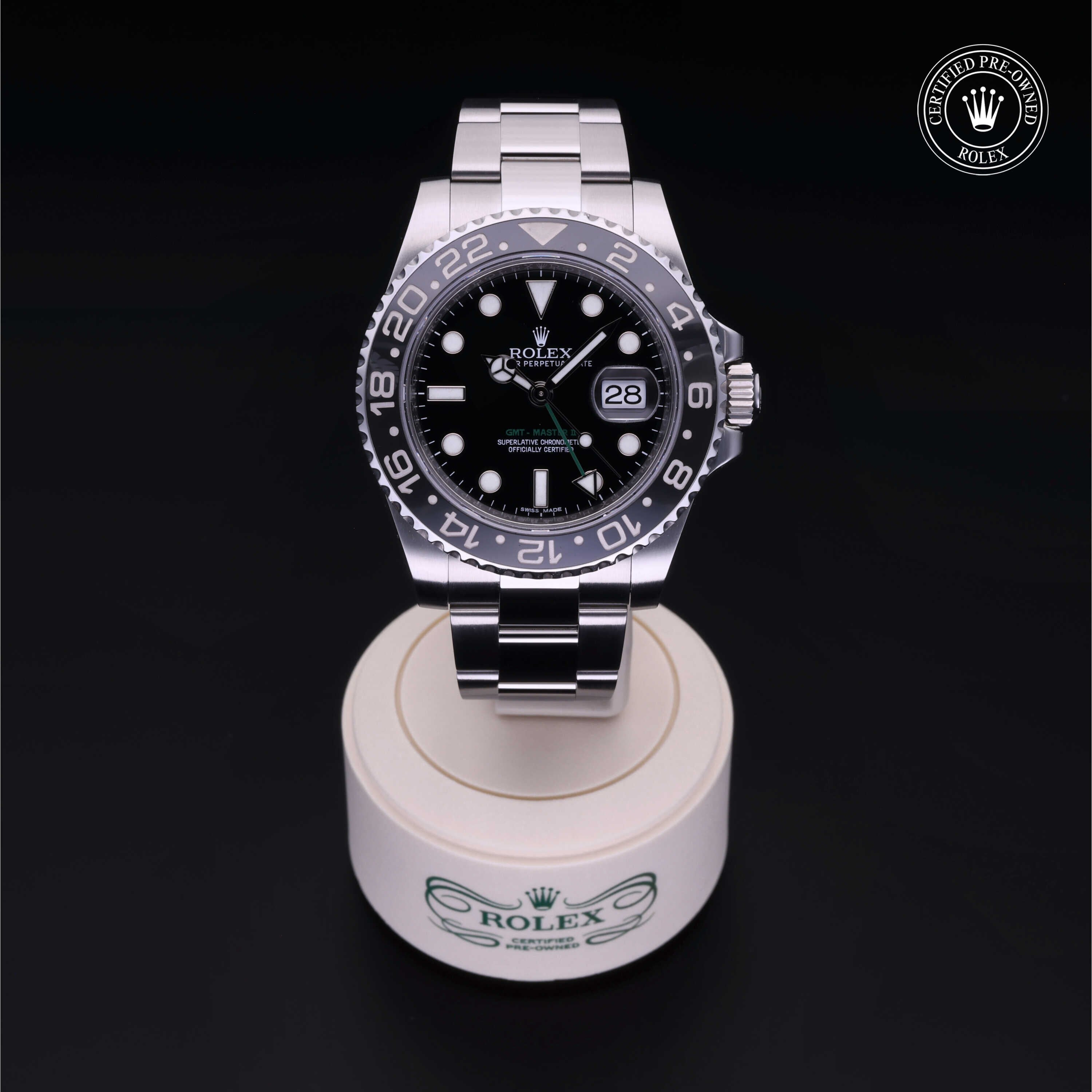Rolex Certified Pre-owned GMT M116710LN-0001 front on black background