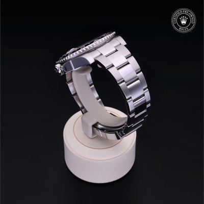 Rolex Certified Pre-owned GMT M116710LN-0001 front on black background