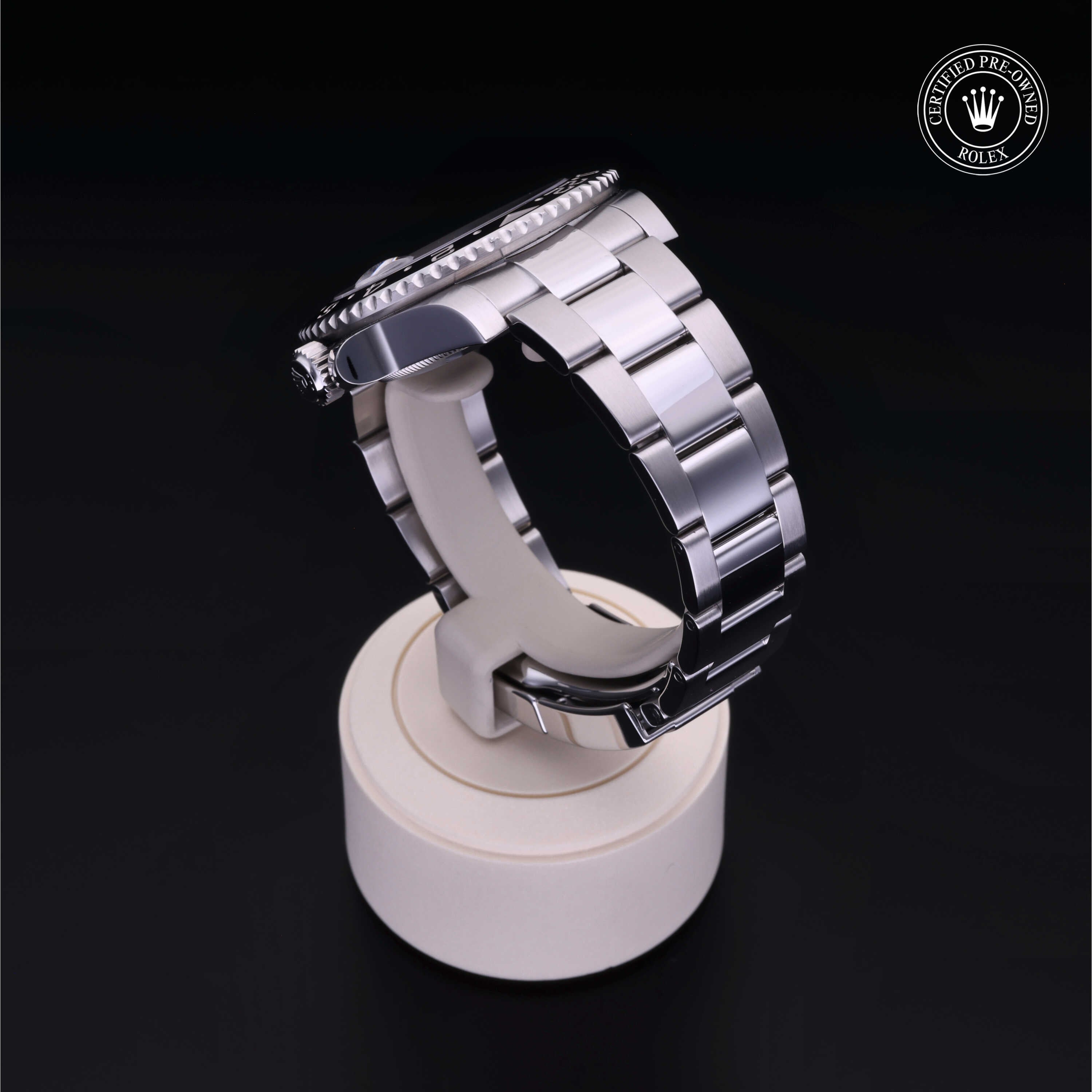 Rolex Certified Pre-owned GMT M116710LN-0001 front on black background